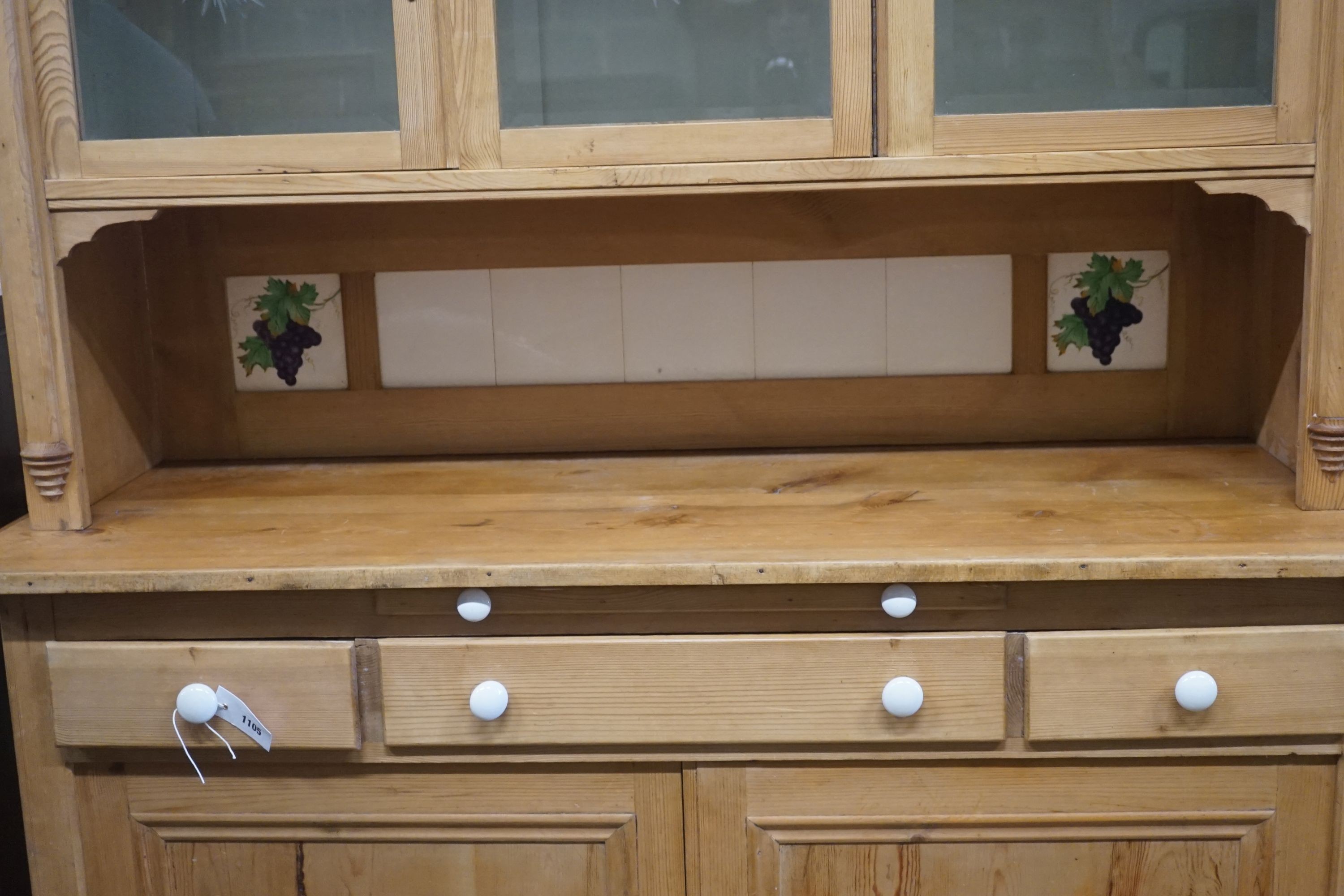 A 19th century Continental pine glazed side cabinet, width 142cm, depth 55cm, height 180cm